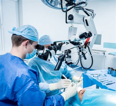 Premium Photo A Team Of Surgeons Performing Brain Surgery To Remove A