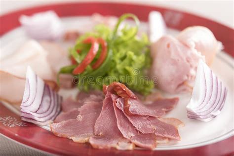 Cold Cuts On Plateau Different Types Of Ham Bacon Salami Tomatoes