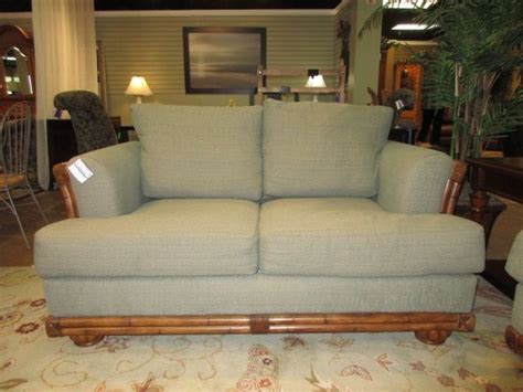 Broyhill Loveseat In A Soft Green Upholstery On Medium Rattan Frame