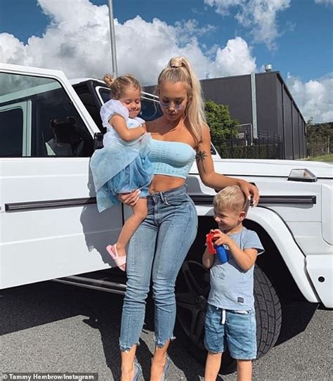 tammy hembrow goes braless underneath busty bandeau crop top while posing with
