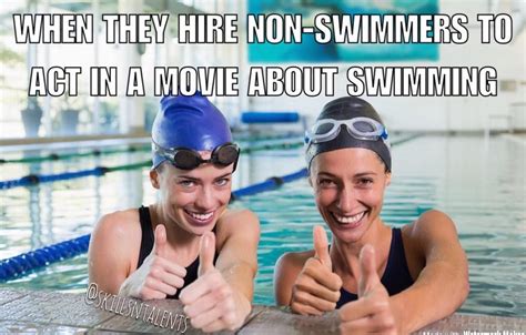 Two Women In Swimming Goggles Giving Thumbs Up