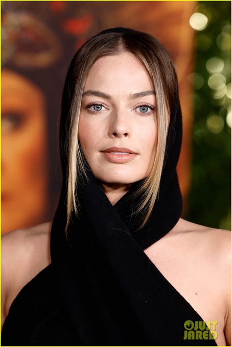Margot Robbie Wows In A Revealing Hooded Dress At Babylon Premiere