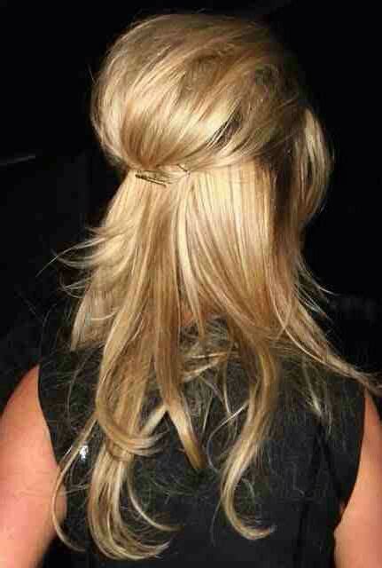 With a large, poofy ponytail paired with a delicate crystal hairpiece. Poofy updo | Hair styles, Weekend hair, Hair beauty