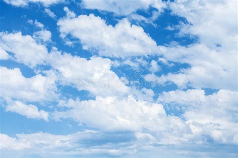 Bright Blue Cloudy Sky Background Texture Stock Image