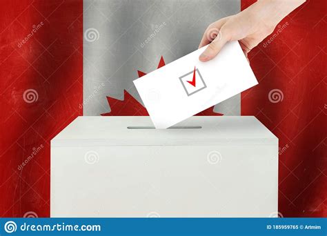 Canadian Vote Concept Voter Hand Holding Ballot Paper For Election