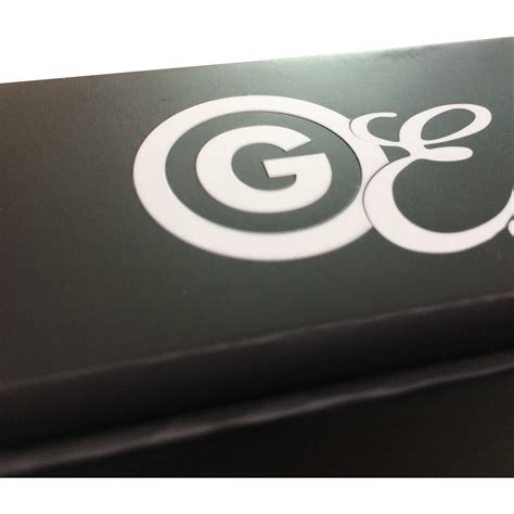 rigid-black-box-with-embossed-section-of-logo-printed-white-logo-printed-custom-printed-boxes