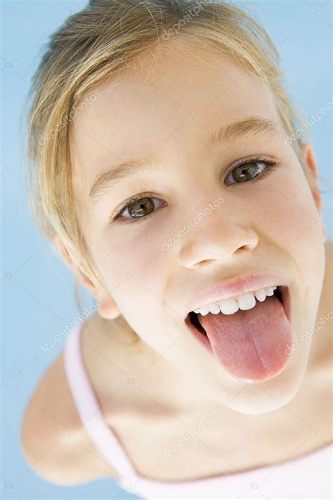 Young Girl Sticking Her Tongue Out — Stock Photo © Monkeybusiness 4781982