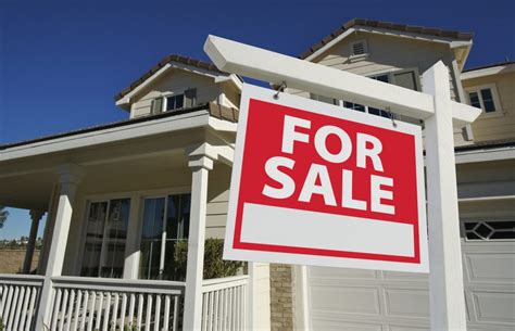 Home For Sale Sign In Front Of New House Pacific Kitchens Inc