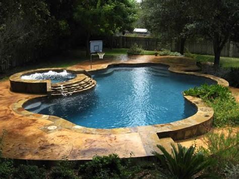 Just A Simple Little Pool With Gorgeous Stone Work And A Runoff Hot Tub