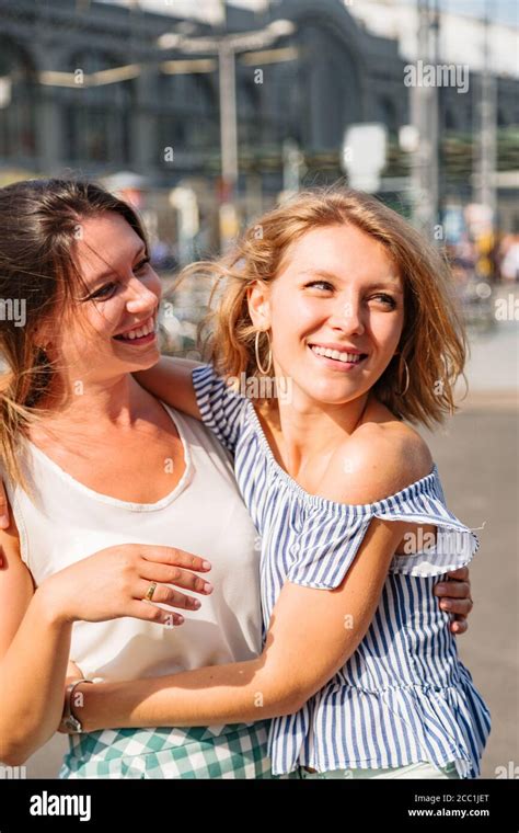 Portrait Of Two Girls Friends Hugging Each Other Stock Photo Alamy