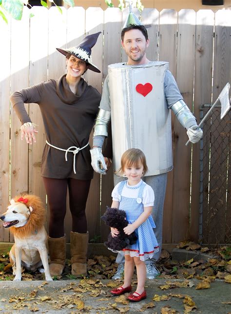 Moms the scarecrow and dad welded his costume together to be the tin man ! 10 Stunning Wizard Of Oz Costume Ideas 2021