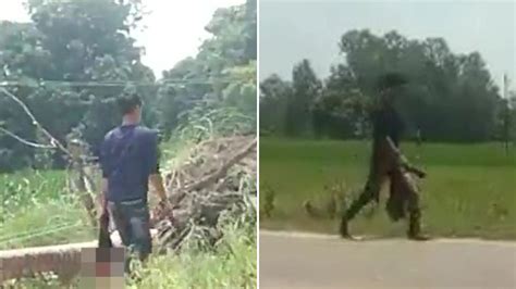 Chilling Moment Man Carries His Sister’s Severed Head In Street After Killing Her For Trying To