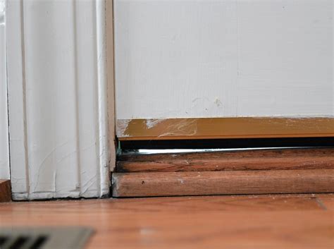 How To Fix A Gap Under Front Door The Door
