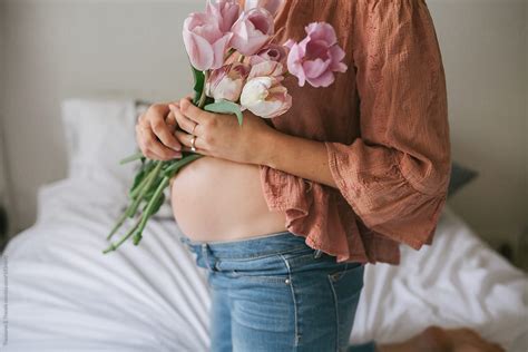 Pregnancy Photos On A Bed By Stocksy Contributor Pink House Organics
