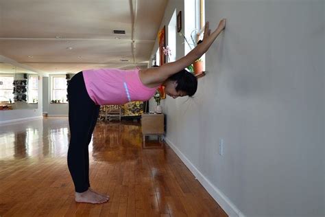 5 Useful Ways To Use A Wall To Improve Your Backbend Practice Doyou