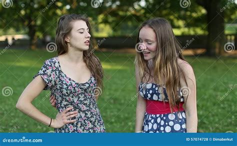 Teen Girls Girlfriend Met In Park And Emotionally Speaking Stock Footage Video Of Hair