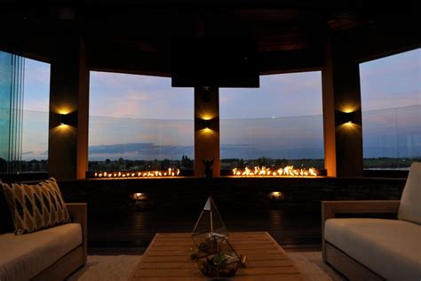 Inside, they create a great room with natural log siding before adding the finishing touches with a grill and hot tub. 26 Fabulous Views From 'Mega Decks' | Mega Decks | DIY