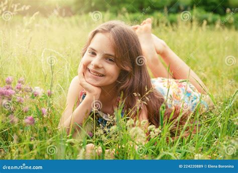 Attractive White Teenage Girl Lies On The Grass Stock Image Image Of