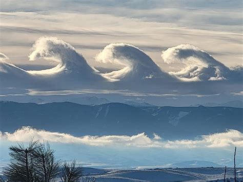 Astounding Wave Clouds Surge Over Wyomings Bighorn Mountains The