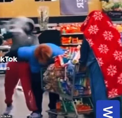 Walmart Worker Is Beaten By Brazen Shoplifter As Two Try To Leave Store With Full Shopping Carts