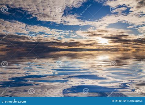 Reflection Of A Beautiful Sunset In Calm Water Natural Background
