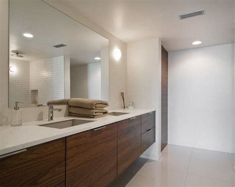 The compact master bathroom comes with ceramic floor combined with glass shower cabin. Large bathroom mirror: 3 design ideas | Bathroom designs ideas
