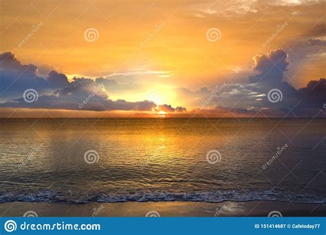 Golden Sunsets In The Sea Beautiful Waves On The Beach Stock Image
