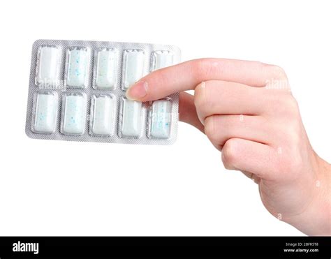 Blister With 10 Chewing Gums In Hand Isolated On White Stock Photo Alamy