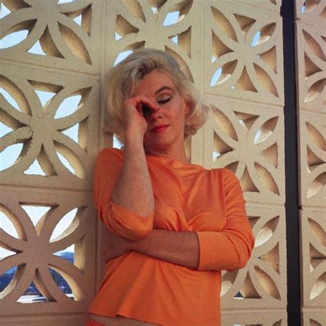 The Top Orange Worn By Marilyn Monroe During A Photo Shoot For George