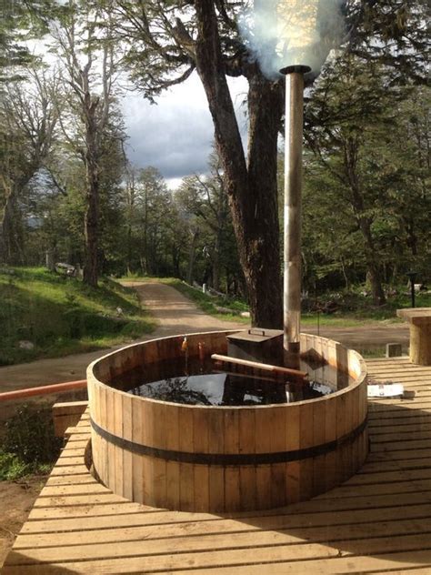 The movers stood the hot tub up on its side and used a thin but sturdy sheet of plastic to slide the tub across the grass to the flatbed. Rustic Cedar Hot Tub Ideas for Natural Atmosphere in 2020 | Cedar hot tub, Hot tub backyard, Hot tub
