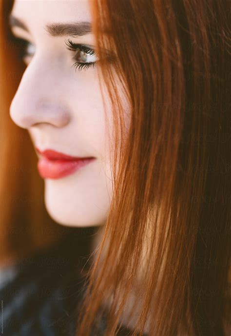 Young Woman With Red Hair In Closeup By Alexey Kuzma