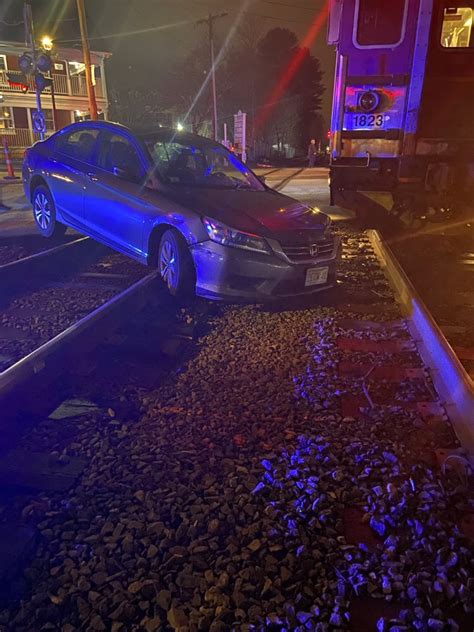 Car Gets Hit By Commuter Rail Train After Getting Stuck On Tracks In