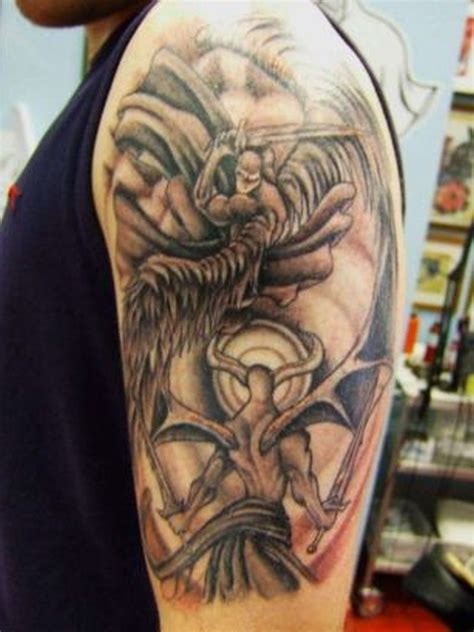 Angel Fighting Demon Tattoo On Arm Tattoos Book 65000 Tattoos Designs