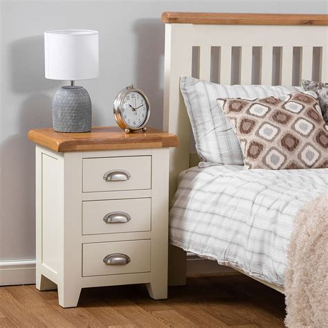 The bedside table, the end table will blend perfectly with your modern or traditional decor. Hampshire Ivory Painted Oak Large 3 Drawer Bedside Table ...