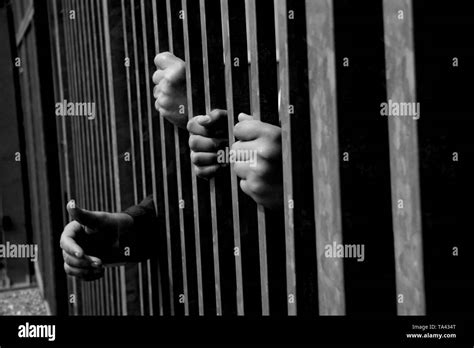 Hands Prison Bar Black And White Stock Photos And Images Alamy