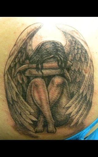 55 Most Amazing Angel Tattoos And Designs Feather Tattoo Design Angel Tattoo Designs Fairy