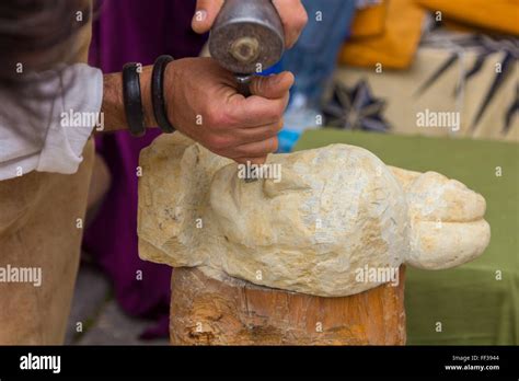 Stone Sculptor Working With His Tools Stock Photo Alamy