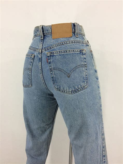 Sz 27 Vintage Levis 550 Light Wash Women S Jeans 27x29 High Waisted Relaxed Fit Tapered Leg 90s
