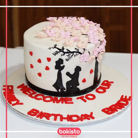 Order delicious anniversary cake online from winni and surprise your loved ones. Tree with Hearts Anniversary Cake-Heart cake ideas-Wedding cake Lahore