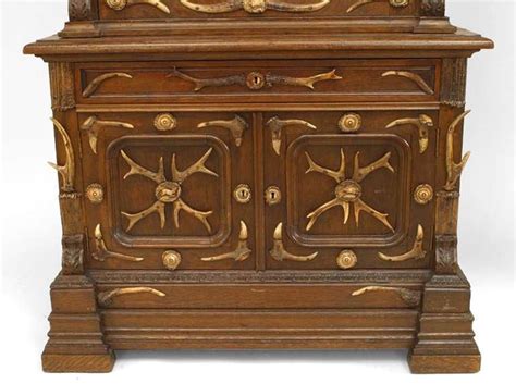 A quality cabinet would complement your pfaff sewing machine. 19th c. German Oak and Horn Gun Cabinet For Sale at 1stdibs
