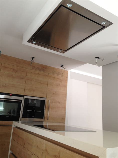 No es sólo diseño, es confort en la cocina. Foto: Campana Techo de Muebles Vallori #550065 - Habitissimo