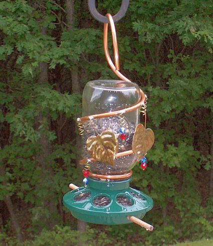 (apparently i am not the only one who loves mason jars and hummingbirds.). Ma's Mason Jar Bird Feeder Jewel Green | Homemade hummingbird feeder, Mason jar bird feeders