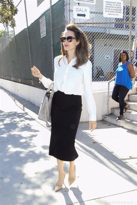 Angelina Jolie Black Pencil Skirt And Blouse Popsugar Fashion