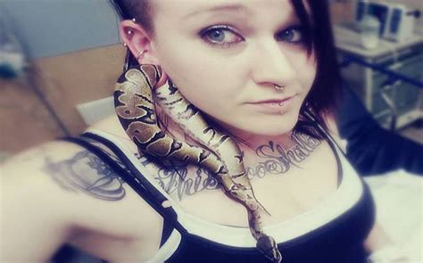 Goes Down In Hissstory Woman Ends Up With A Snake In Her Ear Piercing