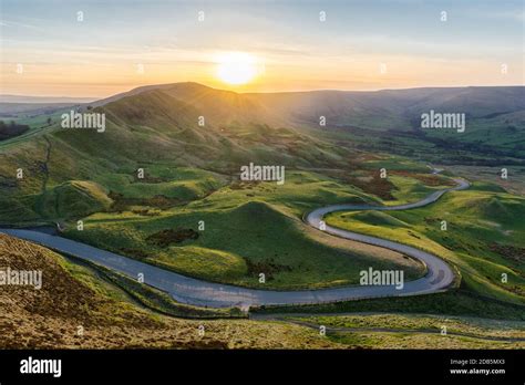 Sunset At Mam Tor In The Peak District With Long Winding Road Leading