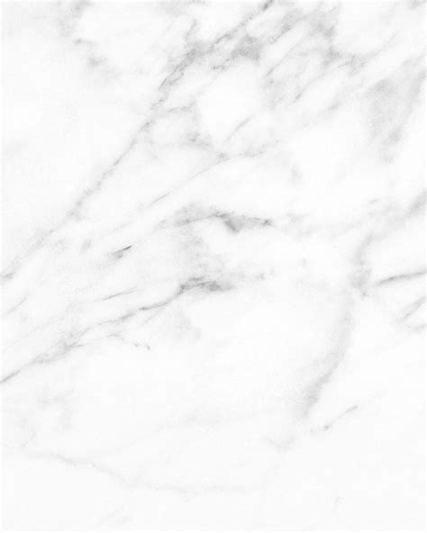 A White Marble Textured Background With Black And Grey Lines In The