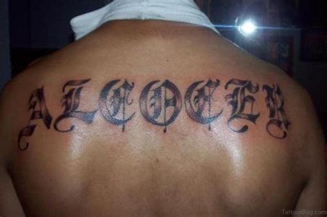 She had a horseshoe tattoo, a feather, a lightning bolt and some pin up girls. 84 Beautiful Old English Tattoos On Back