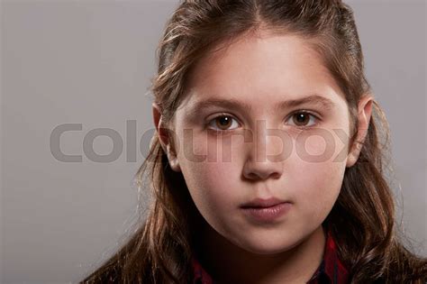 ten year old girl looking to camera close up stock image colourbox