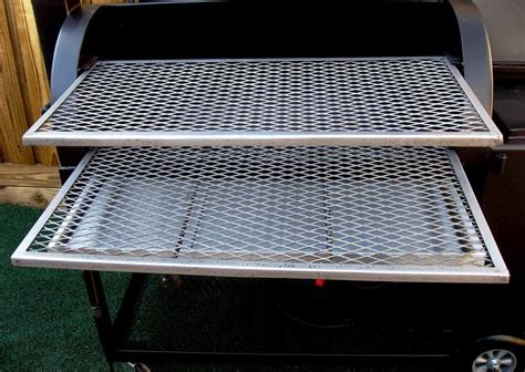 Two Slide Out Cooking Grates Which Are Fully Supported In Model 2442