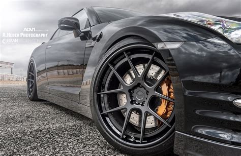 Vibrant Black Nissan GT R Fitted With Custom Parts CARiD Com Gallery